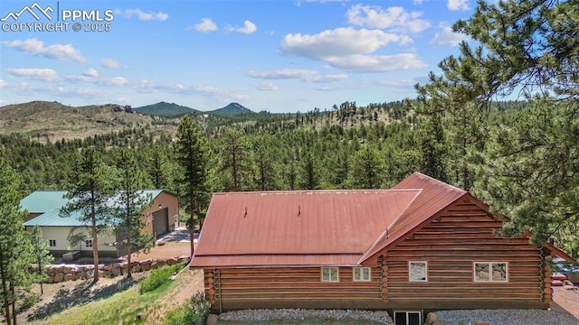 drone / aerial view featuring a mountain view