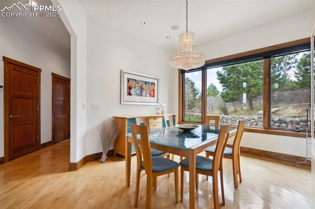 dining space featuring light wood-type flooring