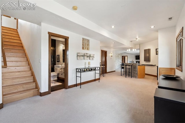 living room with light colored carpet