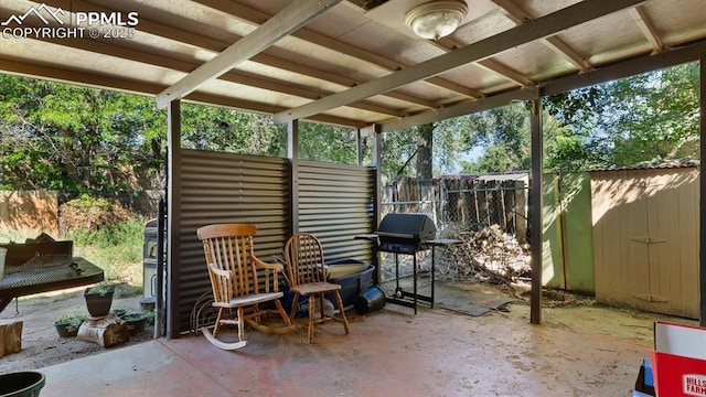 view of patio with a grill