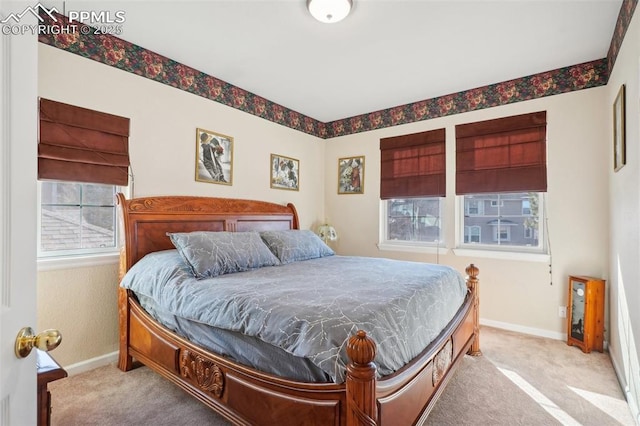 bedroom with light colored carpet