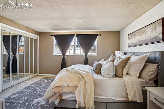 bedroom featuring a textured ceiling