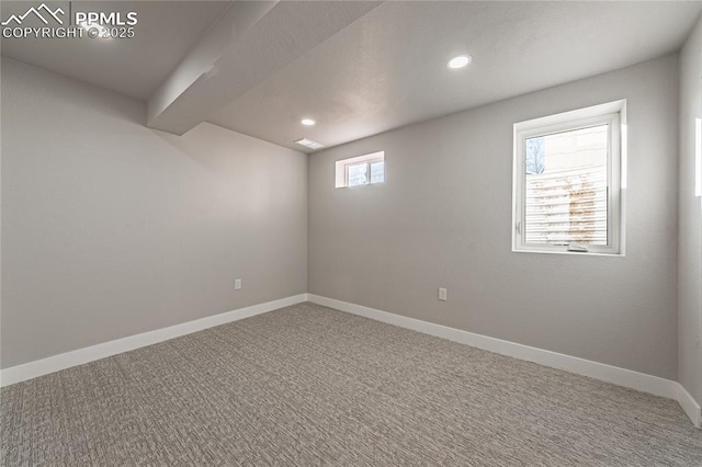 basement featuring carpet flooring