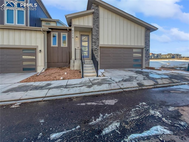 view of front of property with a garage