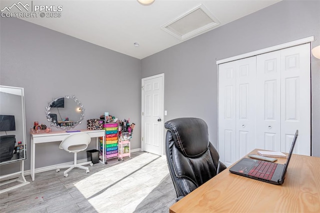 office space with hardwood / wood-style floors