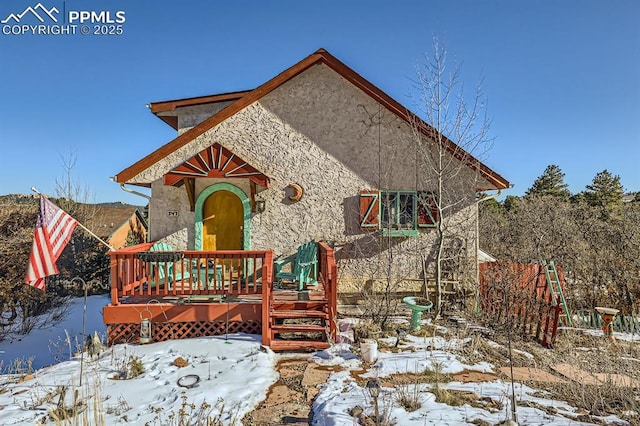 view of front of house featuring a wooden deck