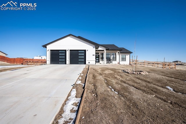 single story home with a garage