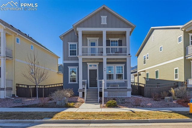 view of front of home featuring a balcony and a porch