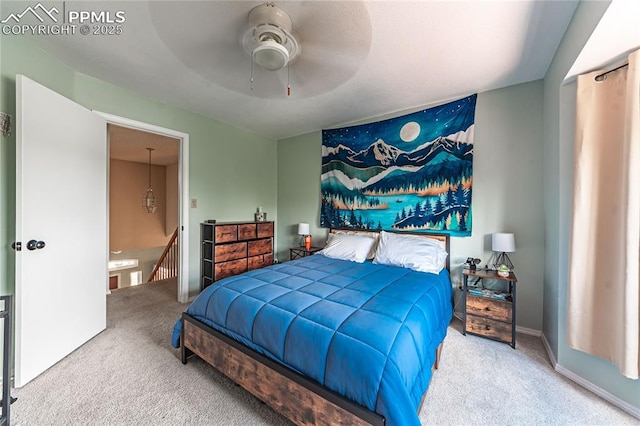 bedroom with ceiling fan and carpet flooring