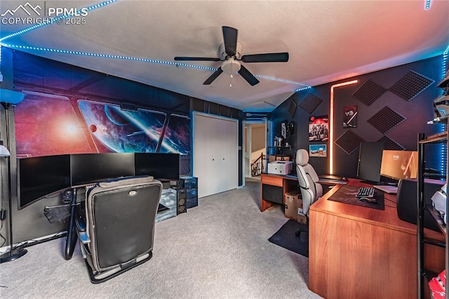 office area with ceiling fan and carpet