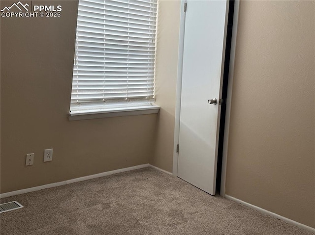 empty room with carpet floors