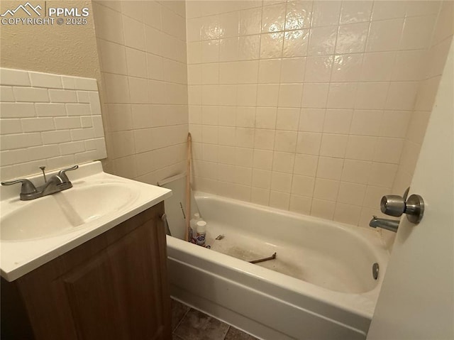 bathroom featuring vanity and shower / tub combo