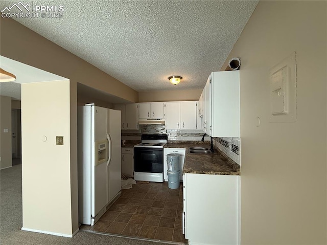 kitchen with sink, backsplash, white cabinets, white appliances, and a textured ceiling