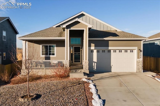 view of front of property with a garage and a porch