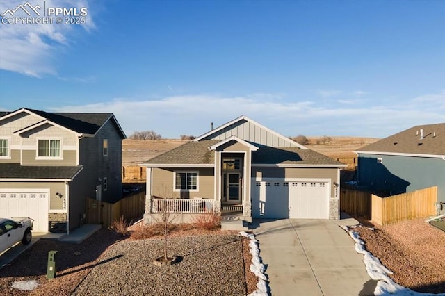 view of front of property with a porch and a garage