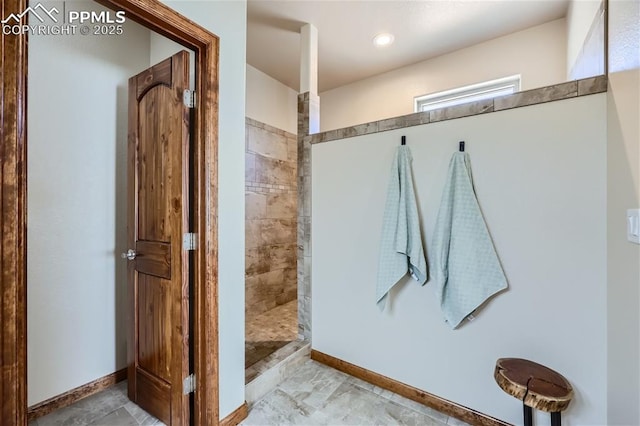 bathroom featuring tiled shower