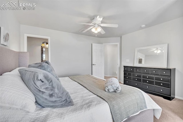 bedroom with ceiling fan and carpet