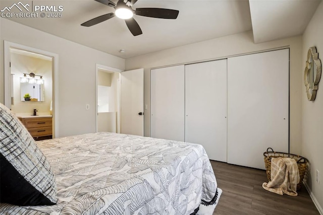 bedroom with connected bathroom, a closet, dark hardwood / wood-style floors, and ceiling fan