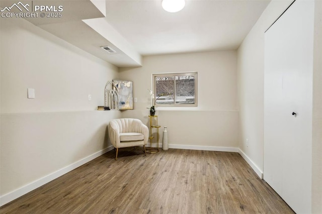 unfurnished room featuring hardwood / wood-style floors