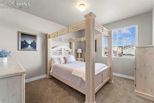 bedroom with decorative columns and light carpet