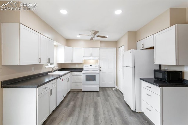 kitchen featuring sink, light wood-type flooring, white cabinets, ceiling fan, and white appliances