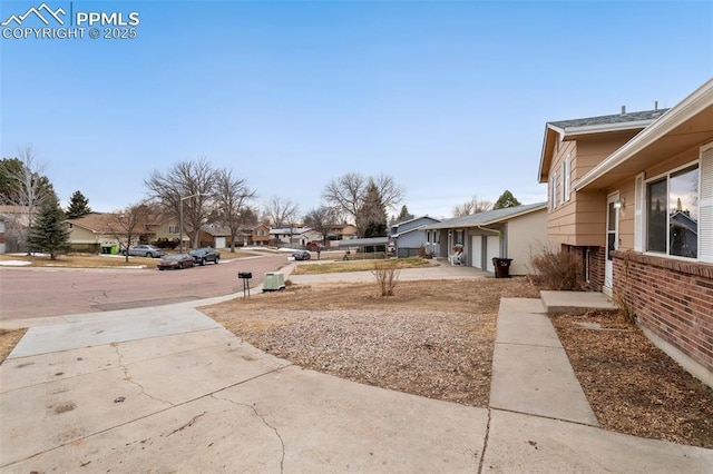 view of yard featuring a garage