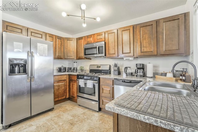 kitchen featuring stainless steel appliances and sink