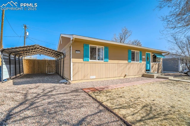 view of front of house featuring a carport