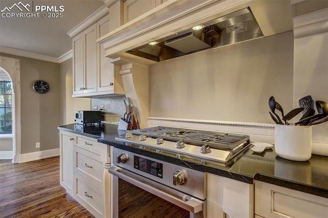 kitchen featuring wall oven, custom range hood, dark wood-type flooring, crown molding, and stainless steel gas stovetop