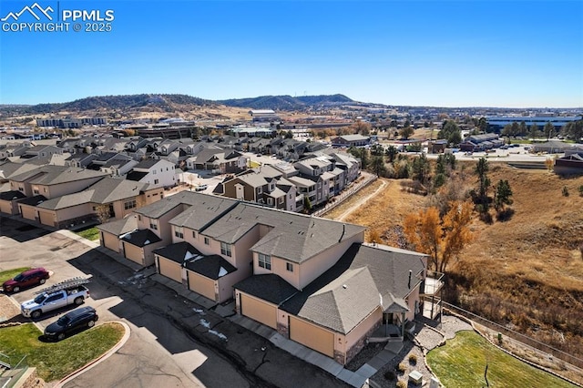 bird's eye view with a mountain view