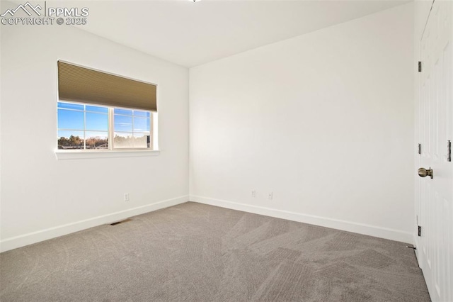 empty room featuring carpet