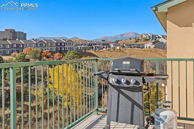 balcony featuring area for grilling and a mountain view