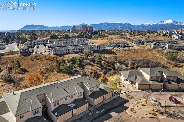 drone / aerial view featuring a mountain view