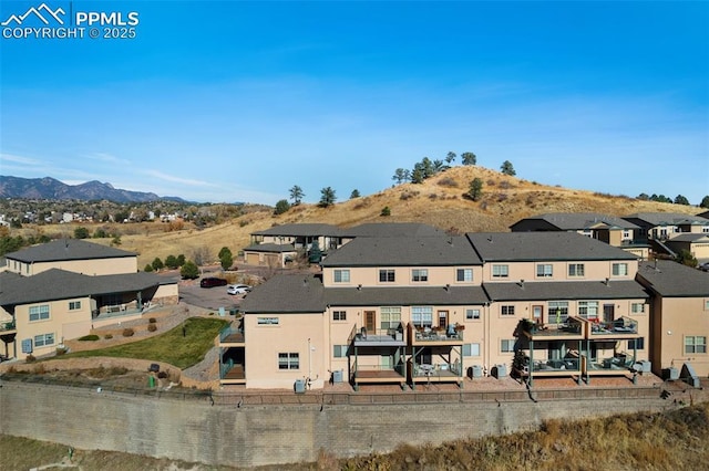 exterior space featuring a mountain view