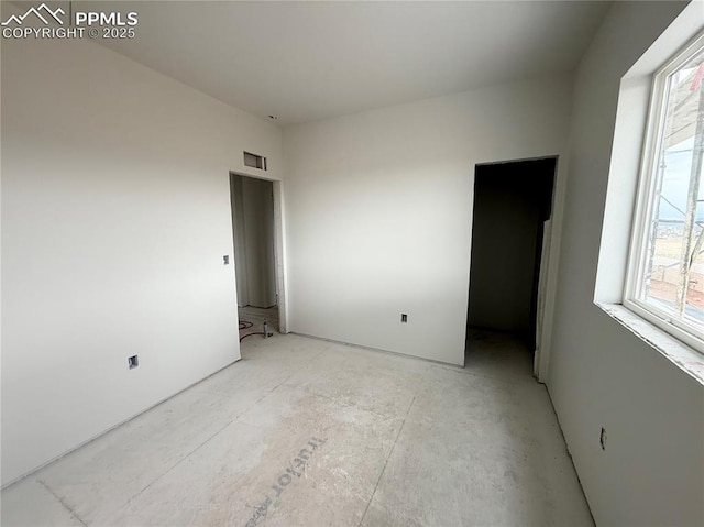 unfurnished bedroom with visible vents