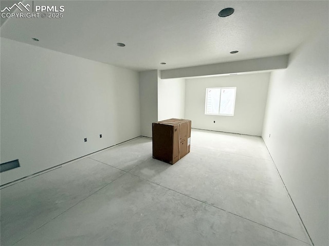 empty room featuring concrete floors