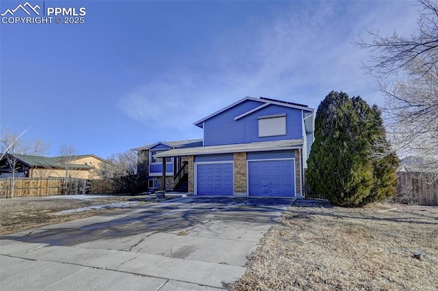 front of property with a garage