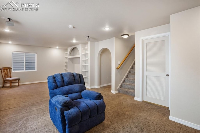 living area with carpet flooring