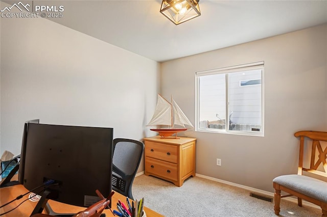 office space with light colored carpet