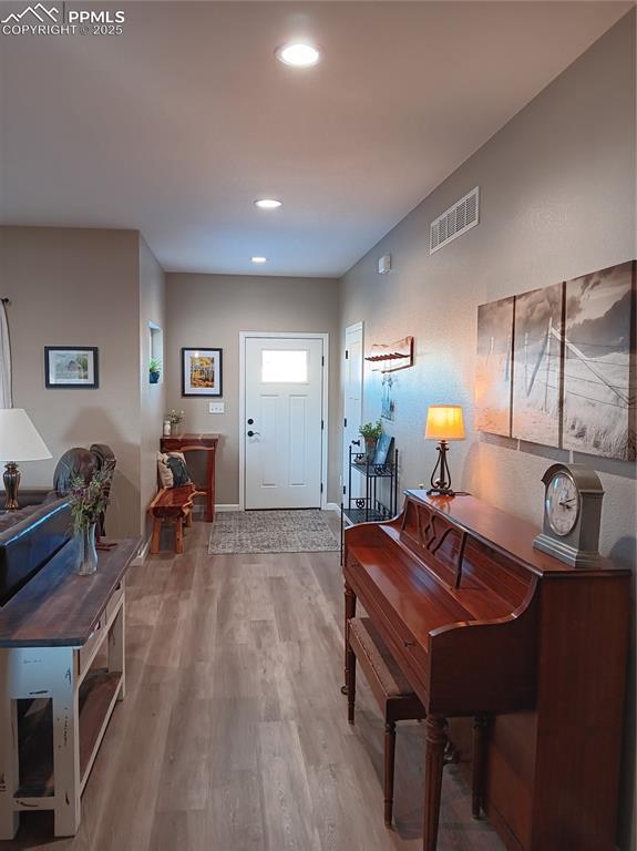 entryway featuring hardwood / wood-style flooring