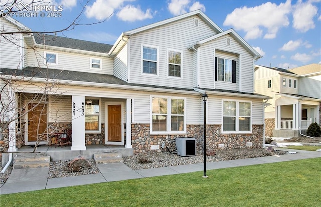 view of property with a front lawn