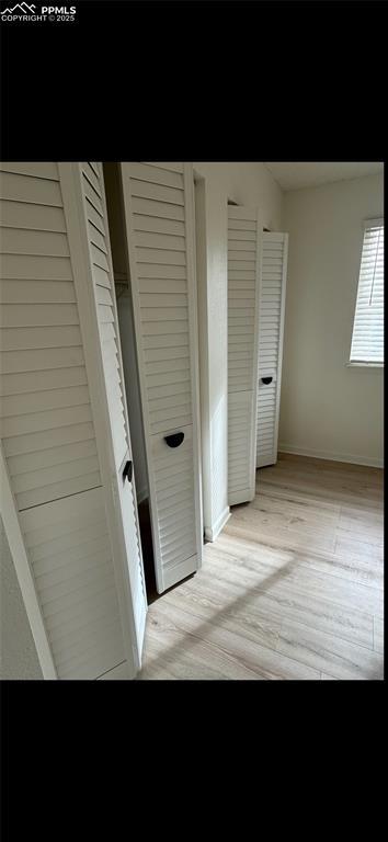 hall featuring light wood-type flooring