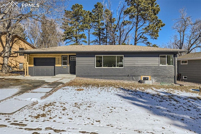 single story home with a garage