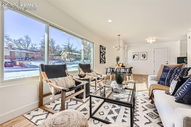 sunroom with a notable chandelier