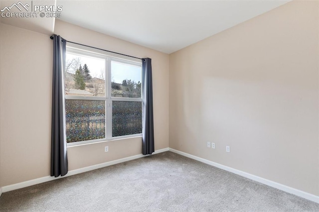 view of carpeted spare room