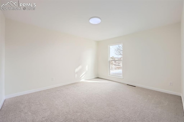 view of carpeted spare room