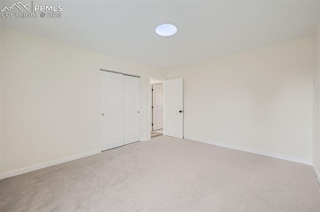 unfurnished room with carpet