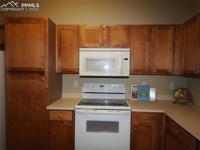 kitchen featuring white appliances