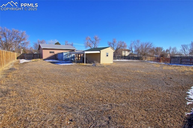 369 G St, Penrose, CO 81240 - rear view of house with a storage shed