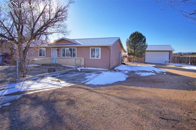 369 G St, Penrose, CO 81240 - view of front facade with a garage